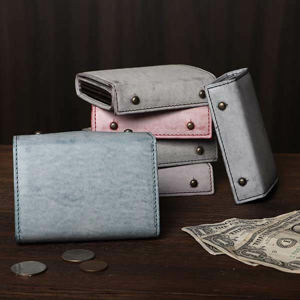 エムピウの二つ折り財布 millefoglie ゴーストレザー P25  